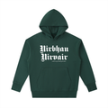 Front view of the Turban Legends® green heavyweight oversized hoodie featuring white Nirbhau Nirvair Gothic text across the chest.