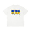 Front view of the Turban Legends® white heavyweight t-shirt featuring a blue and yellow Sikhism The Art of Learning typographic graphic across the chest.