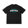 Front view of the Turban Legends® black heavyweight t-shirt featuring a teal and white Battle of Muktsar MDCCXIV collegiate text graphic across the chest.