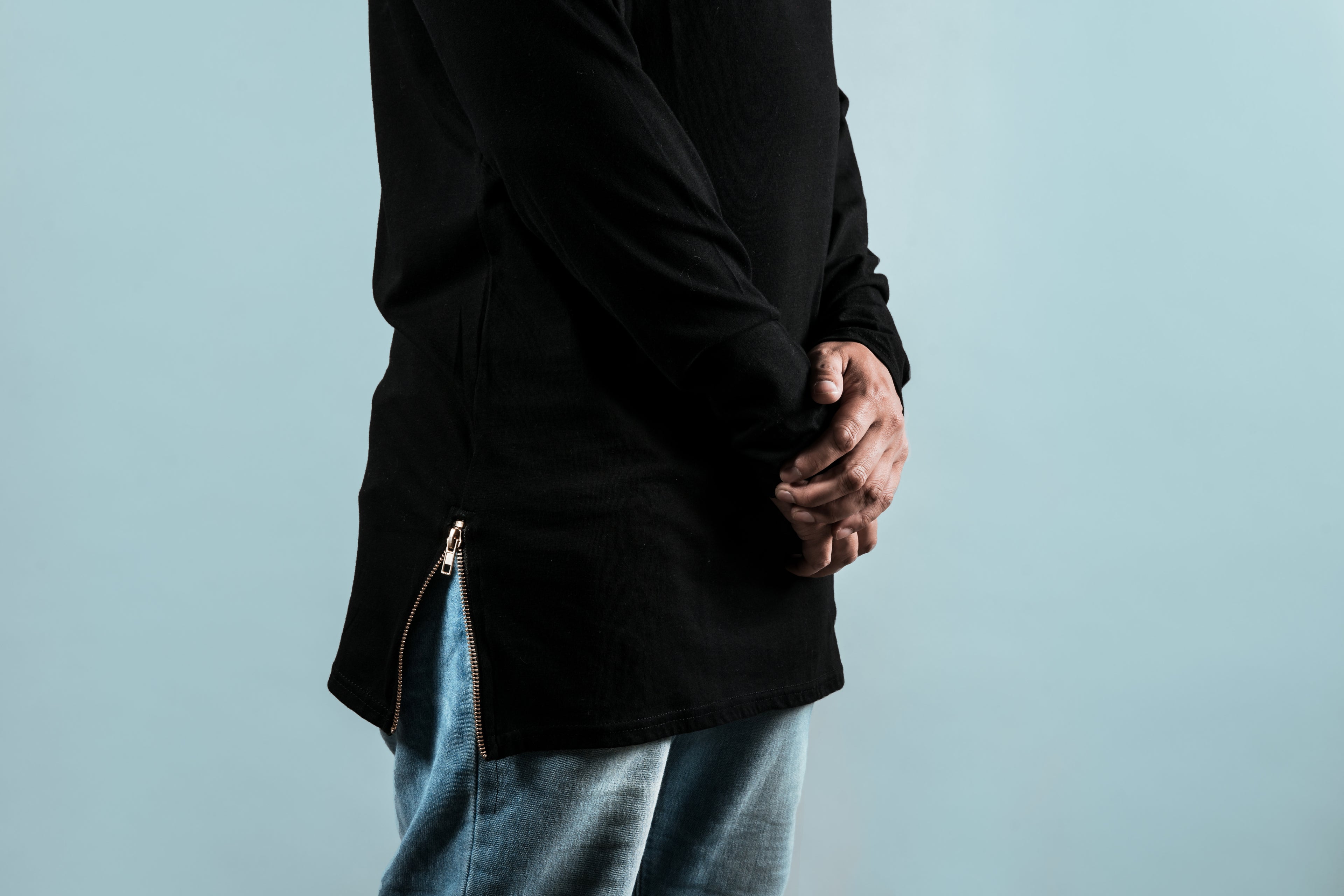 Men wearing a premium black oversized long-sleeve tee with side zipper details from the PunjabiPopShop streetwear collection.